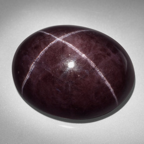 93.5ct Oval Cabochon Black Red Star Garnet Gem for sale 93.5ct Oval Cabochon Black Red Star Garnet Gem (ID: 404009)