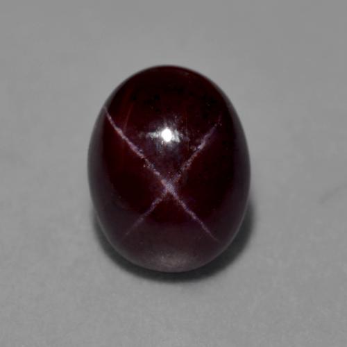 Rouge acajou Grenat Étoilé gemme - 4.9ct Ovale Cabochon (ID: 574642)