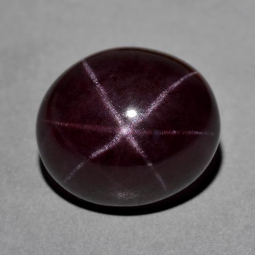 Темно-красный Звездчатый Гранат Камень - 25.2ct Овал Кабошон (ID: 574676)
