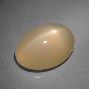 オレンジクリーム スタームーンストーン 宝石 - 7.4ct オーバル カボション (ID: 416963)