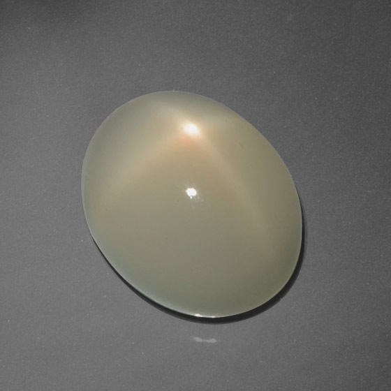 Earthy Brown Звездчатый Лунный Камень Камень - 7.3ct Овал Кабошон (ID: 418408)