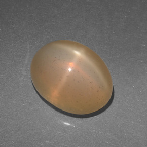 6ct Oval Cabochon Cream Peach Star Moonstone for sale thumb image of 6ct Oval Cabochon Cream Peach Star Moonstone (ID: 418680)