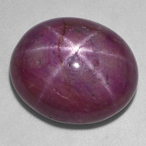 Красновато-пурпурный Звездчатый Рубин Камень - 25.5ct Овал Кабошон (ID: 522967)
