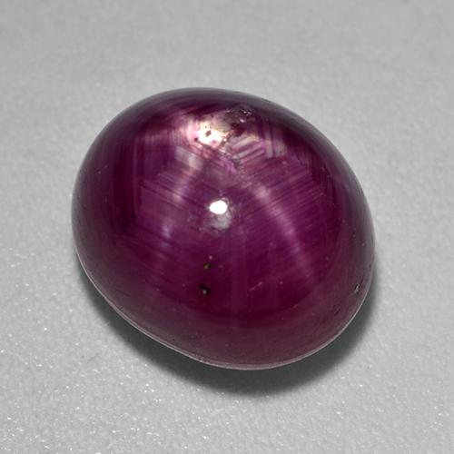 Rojo púrpura Rubí Estrella Gema - 6.8ct Cabujón Óvalo (ID: 527192)