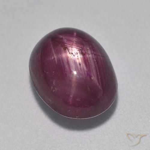 Rubino stellato 10,1 x 8,1mm viola Ovale cabochon dal Madagascar, peso di 5,53 ct, gemma naturale Riempimento delle fessure in purezza Opaque, 1 pezzo Rubino stellato - Colore: Viola medio-scuro, durezza Mohs di 9 adatto per gioielli da indossare ogni giorno, Photo A