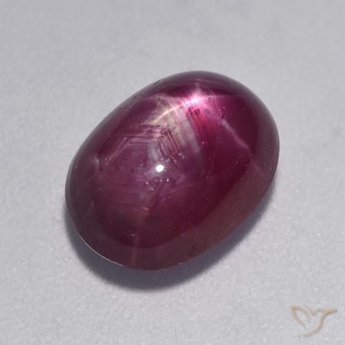 Pourpre moyen-foncé Rubis Étoilé gemme - 4.3ct Ovale Cabochon (ID: 527870)