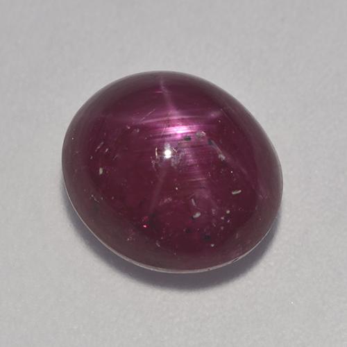 Pourpre moyen-foncé Rubis Étoilé gemme - 5.6ct Ovale Cabochon (ID: 528198)
