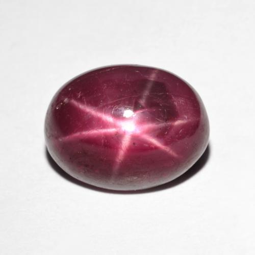 8.22ct Oval Dark Red Star Ruby from Madagascar, Dimension 12.3 x 9.3mm, Natural heated Gemstone, Opaque Clarity, 1pc Oval Cabochon Star Ruby, Mohs Hardness of 9 suitable for daily wear jewelry, Photo A