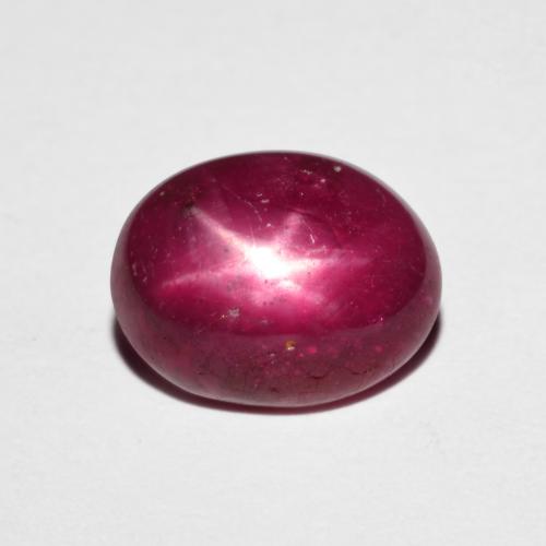 10.4 x 8.1mm Oval Red Star Ruby from Madagascar, Weight of 4.19ct, Natural heated Gemstone in Opaque Clarity, 1pc Oval Cabochon Star Ruby - Color: Dark Red, Mohs Hardness of 9 suitable for daily wear jewelry, Photo A