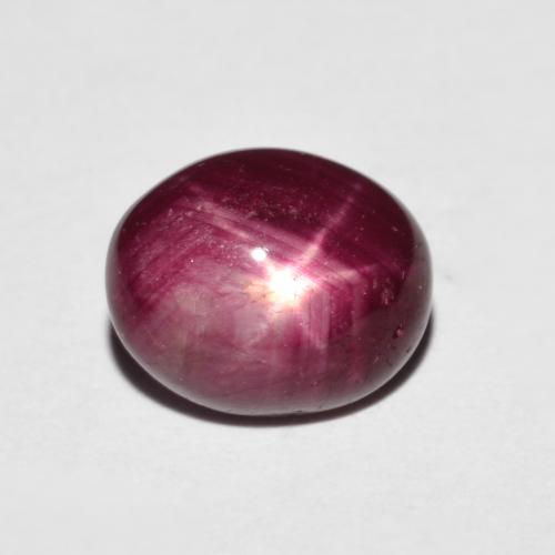 9 x 7.4mm Oval Red Star Ruby from Madagascar, Weight of 3.39ct, Natural heated Gemstone in Opaque Clarity, 1pc Oval Cabochon Star Ruby - Color: Dark Red, Mohs Hardness of 9 suitable for daily wear jewelry, Photo A