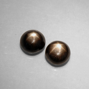 1.97 ct Black Star Sapphire Gemstone, Star Sapphire Gem in Round Cabochon Shape for Sale.