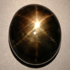 24.91 ct Black Star Sapphire Gemstone, Star Sapphire Gem in Oval Cabochon Shape for Sale.