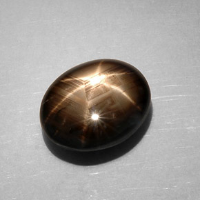 7.59 ct Black Star Sapphire Gemstone, Star Sapphire Gem in Oval Cabochon Shape for Sale.