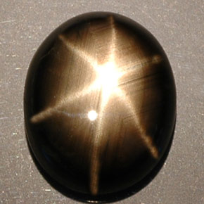5.25 ct Black Star Sapphire Gemstone, Star Sapphire Gem in Oval Cabochon Shape for Sale.