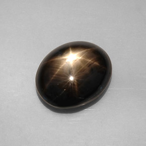 8.19 ct Black Star Sapphire Stone, Natural Star Sapphire in Oval Cabochon Shape for Sale