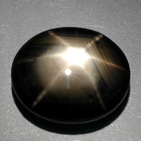 9.39 ct Black Star Sapphire Gemstone, Star Sapphire Gem in Oval Cabochon Shape for Sale.