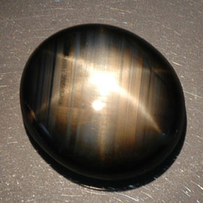 16.89 ct Black Star Sapphire Gemstone, Star Sapphire Gem in Oval Cabochon Shape for Sale.