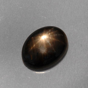 1.59 ct Black Star Sapphire Gemstone, Star Sapphire Gem in Oval Cabochon Shape for Sale.