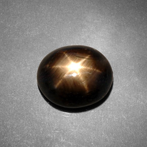 7.46 ct Black Star Sapphire Stone, Natural Star Sapphire in Oval Cabochon Shape for Sale