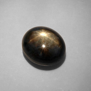 12.34 ct Black Star Sapphire Gemstone, Star Sapphire Gem in Oval Cabochon Shape for Sale.