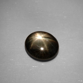 3.99 ct Black Star Sapphire Gemstone, Star Sapphire Gem in Oval Cabochon Shape for Sale.