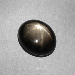 7.90 ct Black Star Sapphire Stone, Natural Star Sapphire in Oval Cabochon Shape for Sale