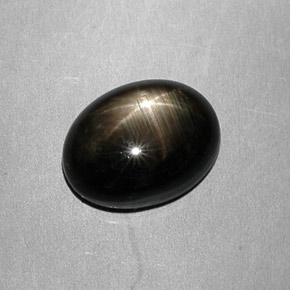 7.49 ct Black Star Sapphire Stone, Natural Star Sapphire in Oval Cabochon Shape for Sale