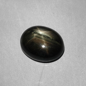 6.26 ct Black Star Sapphire Gemstone, Star Sapphire Gem in Oval Cabochon Shape for Sale.