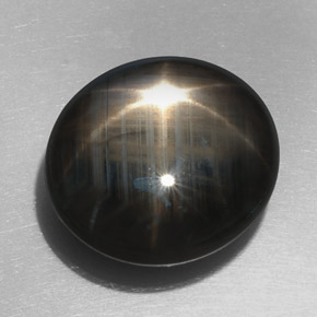 32.76 ct Black Star Sapphire Stone, Natural Star Sapphire in Oval Cabochon Shape for Sale