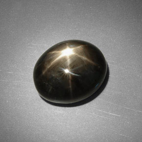 5.75 ct Black Star Sapphire Gemstone, Star Sapphire Gem in Oval Cabochon Shape for Sale.