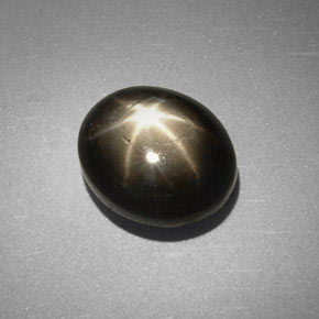 6.38 ct Black Star Sapphire Gemstone, Star Sapphire Gem in Oval Cabochon Shape for Sale.