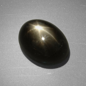 7.55 ct Black Star Sapphire Gemstone, Star Sapphire Gem in Oval Cabochon Shape for Sale.