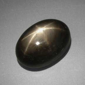 7.78 ct Black Star Sapphire Gemstone, Star Sapphire Gem in Oval Cabochon Shape for Sale.