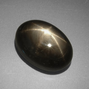 7.78 ct Black Star Sapphire Stone, Natural Star Sapphire in Oval Cabochon Shape for Sale