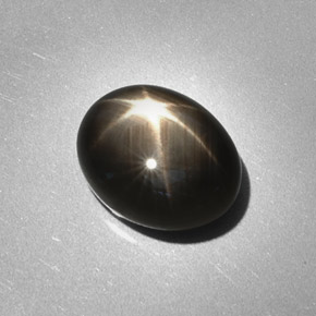 6.28 ct Black Star Sapphire Gemstone, Star Sapphire Gem in Oval Cabochon Shape for Sale.