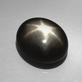 27.17 ct Black Star Sapphire Stone, Natural Star Sapphire in Oval Cabochon Shape for Sale