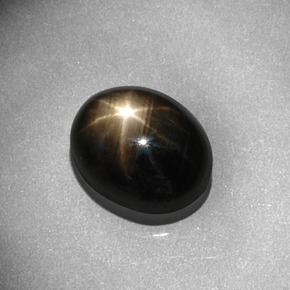 8.13 ct Black Star Sapphire Gemstone, Star Sapphire Gem in Oval Cabochon Shape for Sale.