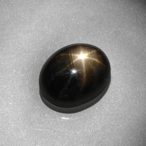 8.13 ct Black Star Sapphire Stone, Natural Star Sapphire in Oval Cabochon Shape for Sale
