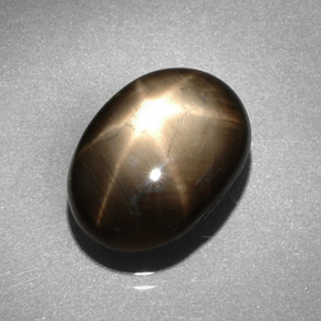 6.62 ct Black Star Sapphire Gemstone, Star Sapphire Gem in Oval Cabochon Shape for Sale.