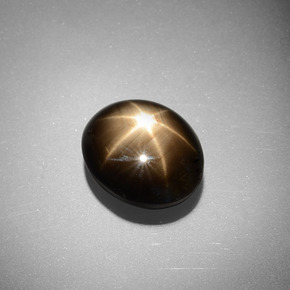 6.98 ct Black Star Sapphire Stone, Natural Star Sapphire in Oval Cabochon Shape for Sale