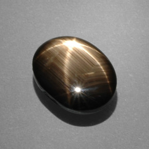 7.53 ct Black Star Sapphire Gemstone, Star Sapphire Gem in Oval Cabochon Shape for Sale.