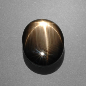7.53 ct Black Star Sapphire Stone, Natural Star Sapphire in Oval Cabochon Shape for Sale