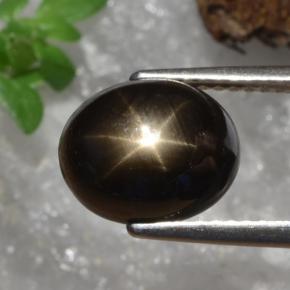 4.91 ct Black Star Sapphire Gemstone, Star Sapphire Gem in Oval Cabochon Shape for Sale.