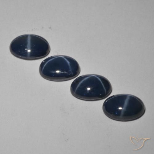 Star Sapphire Gemstones in 7 x 5 mm (calibrated) Size for Sale, Star Sapphire Stones in Deep Navy Blue Color