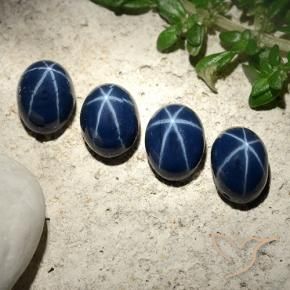 Star Sapphire Gemstones in 7 x 5 mm (calibrated) Size for Sale, Star Sapphire Stones in Deep Navy Blue Color