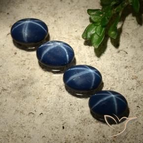 Star Sapphire Gemstones in 7 x 5.2 mm Size for Sale, Star Sapphire Stones in Deep Navy Blue Color
