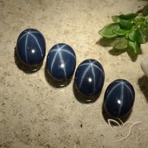 Star Sapphire Gemstones in 7.1 x 5.3 mm Size for Sale, Star Sapphire Stones in Deep Navy Blue Color