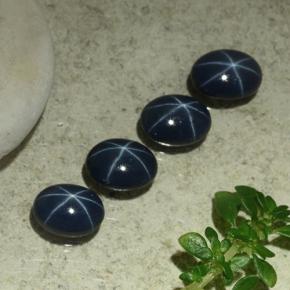 Star Sapphire Gemstones in 7.1 x 5.2 mm Size for Sale, Star Sapphire Stones in Deep Navy Blue Color