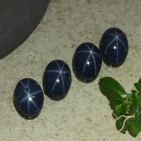 Star Sapphire Gemstones in 7 x 5 mm (calibrated) Size for Sale, Star Sapphire Stones in Deep Navy Blue Color