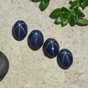 Star Sapphire Gemstones in 7 x 5 mm (calibrated) Size for Sale, Star Sapphire Stones in Deep Navy Blue Color